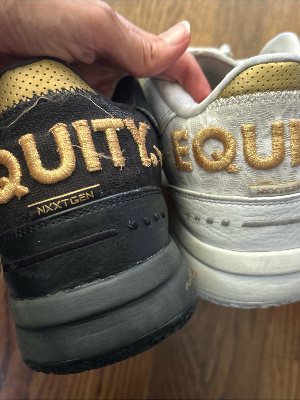 Rare Kobe Bryant “Equality” Nike sneakers in black and white colorway with gold